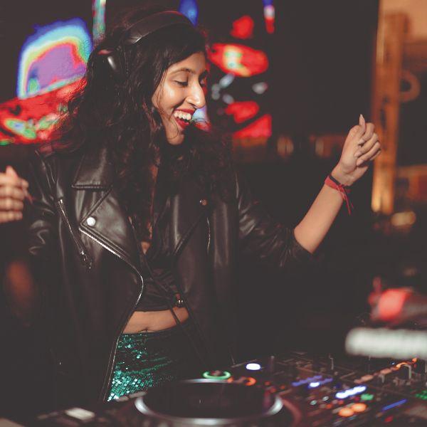 Female DJ performing