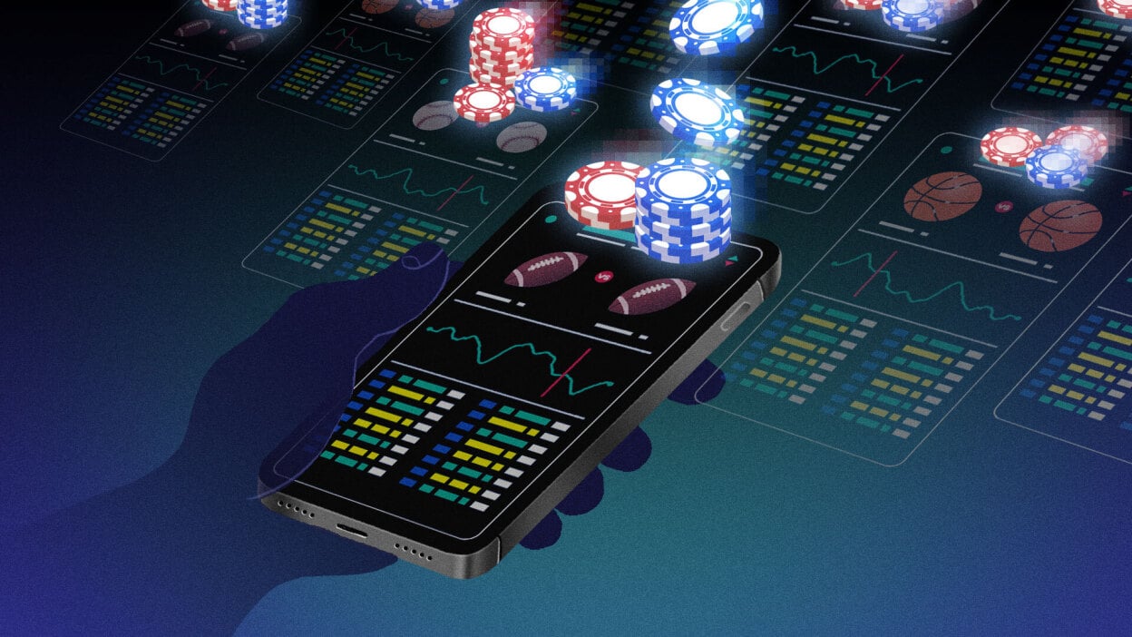 Mobile phone showing sports and gaming interface