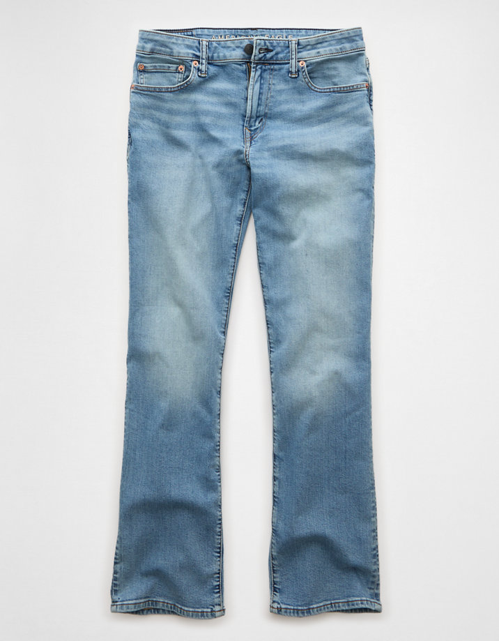 Light wash bootcut jeans laid flat showing a subtle opening at the hem