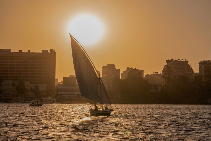 Felucca sailing at sunset on the Nile