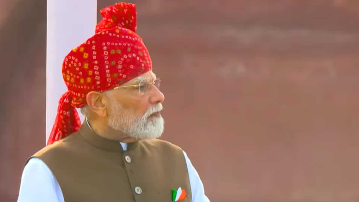 Close-up of Prime Minister Narendra Modi in a traditional red turban during the Independence Day ceremony at the Red Fort