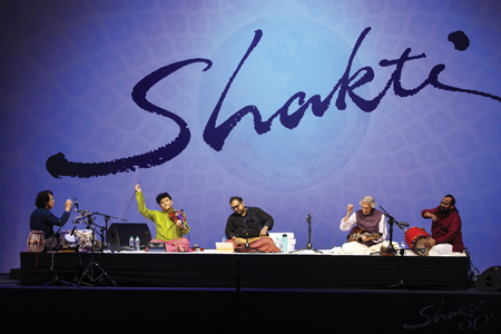 Shakti performing