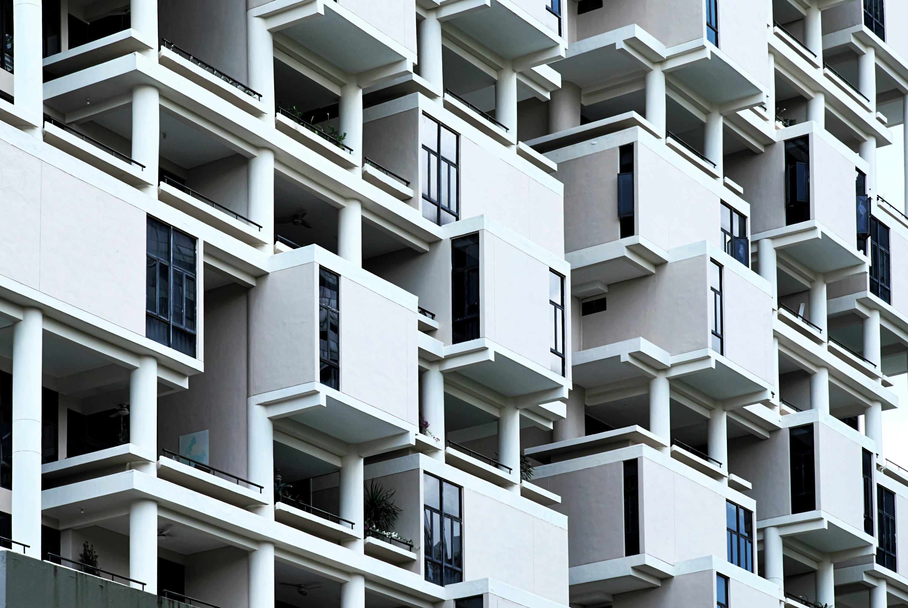 Geometric facade of a contemporary multi-family residential building