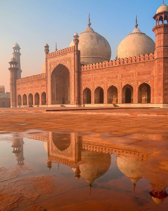 Badshahi Mosque domes reflected after rain, Lahore
