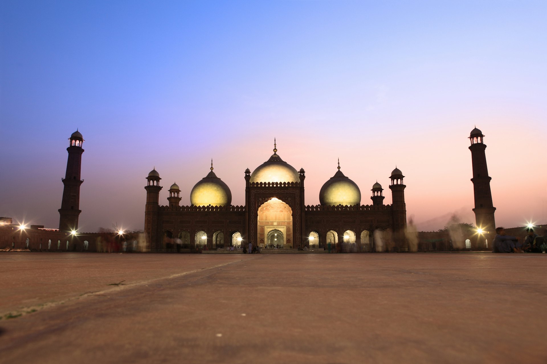 Badshahi Mosque illuminated at dusk