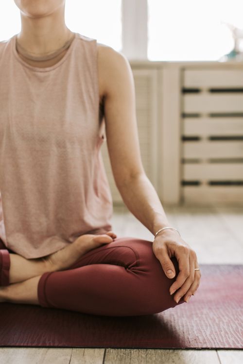 Member practicing guided meditation as part of her World Health Treat wellness plan