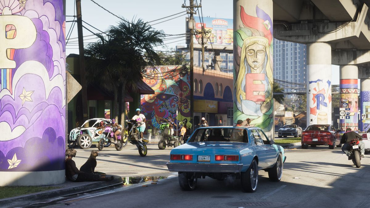 GTA VI screenshot ufficiale: street life a Vice City con murales e lowrider