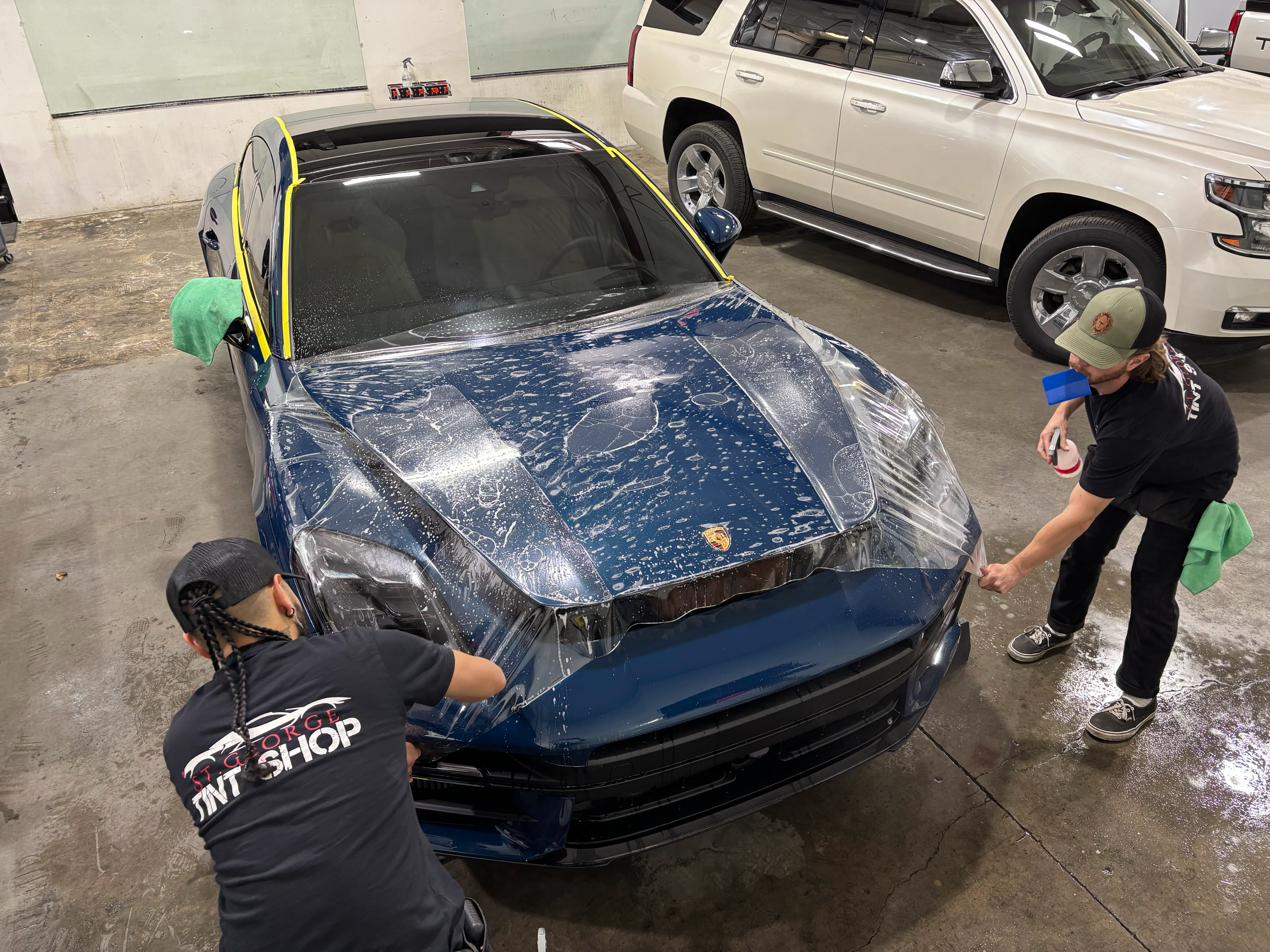 Paint protection film installation on car bonnet at AUTO GLAZE
