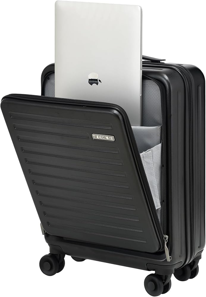 A black carry-on suitcase with front pocket holding a laptop