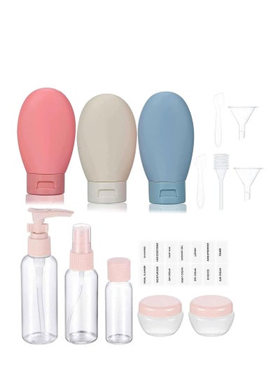 A set of small refillable travel bottles and spray containers