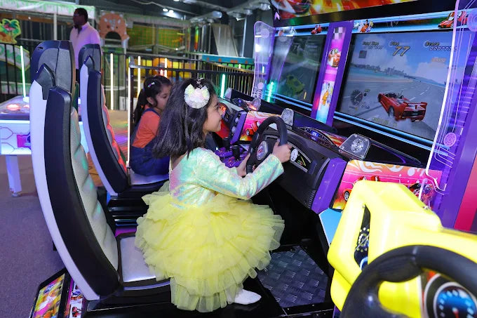 Kids playing interactive arcade games