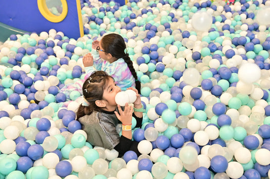 Children playing in the ball pool at HOPPERS kids play area Noida