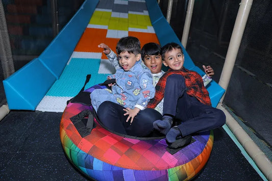 Children on the tube slide