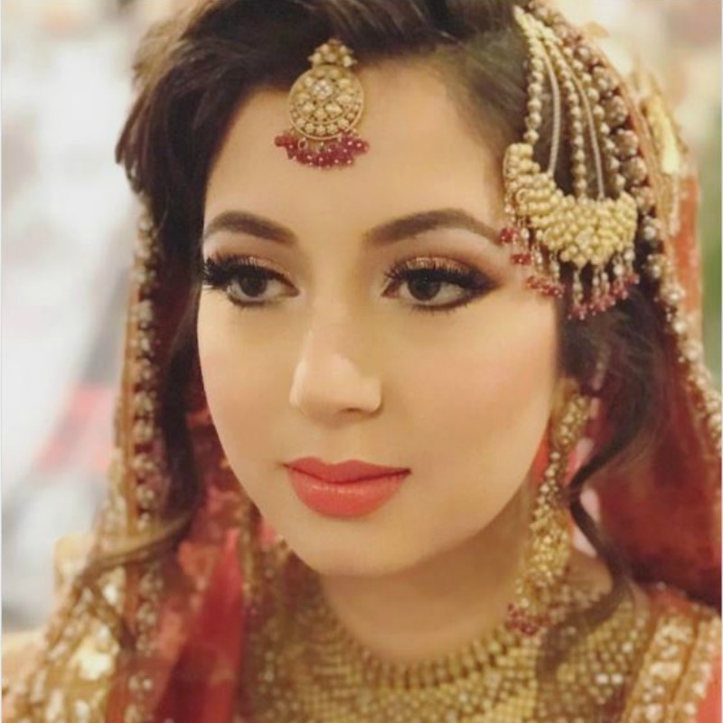 Signature bridal make-up — luminous base and intricate eye detail