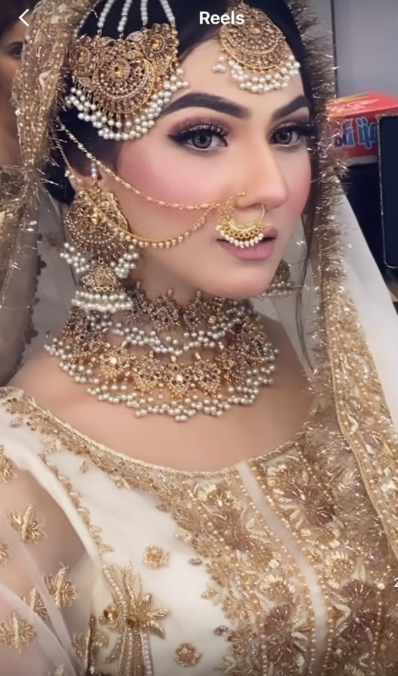 Walima bride in ivory with pearl jewellery